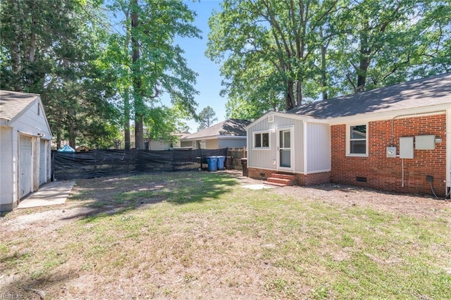 1204 Elder Ave, Chesapeake, VA 23325 - view of yard with entry steps and an outdoor structure