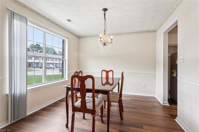 59 Terri Sue Ct, Hampton, VA 23666 - dining room featuring healthy amount of natural light, a chandelier, and dark wood finished floors