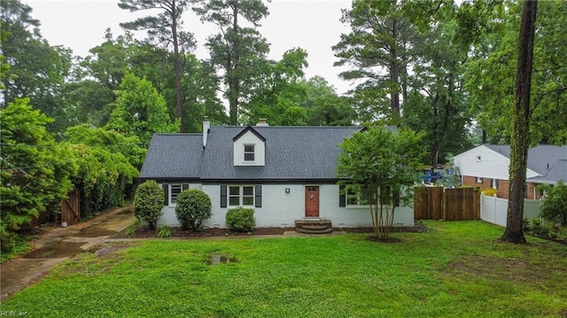 4328 Thoroughgood Dr, Virginia Beach, VA 23455 - new england style home featuring a chimney and view of wooded area