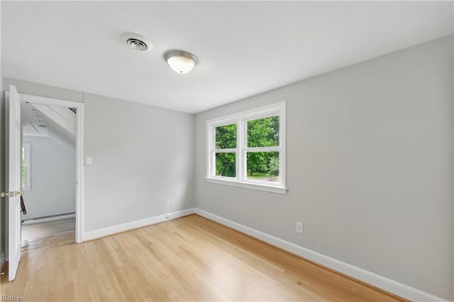 4328 Thoroughgood Dr, Virginia Beach, VA 23455 - unfurnished room with light wood-style flooring, baseboards, and baseboard heating