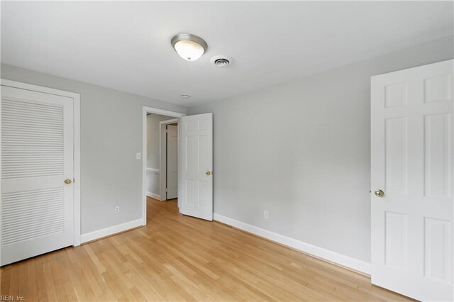 4328 Thoroughgood Dr, Virginia Beach, VA 23455 - unfurnished bedroom featuring baseboards and light wood-style floors