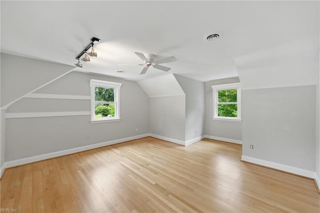 4328 Thoroughgood Dr, Virginia Beach, VA 23455 - additional living space with ceiling fan, vaulted ceiling, baseboards, and light wood-style flooring