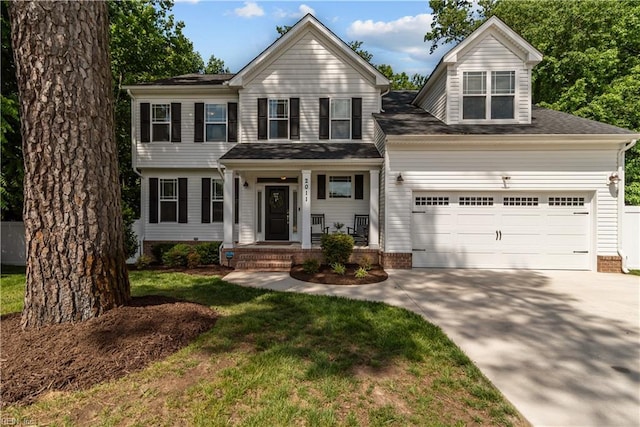 2011 River Pearl Way, Chesapeake, VA 23321 - view of front of property featuring a garage, concrete driveway, and a front lawn