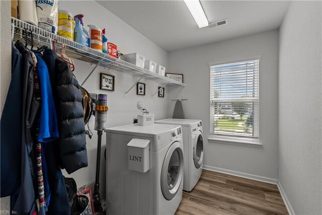 2011 River Pearl Way, Chesapeake, VA 23321 - washroom with washing machine and clothes dryer, light wood-style floors, and baseboards