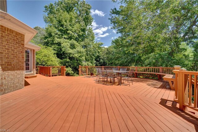 1268 Smith Cove Cir, Virginia Beach, VA 23455 - deck featuring outdoor dining area and view of scattered trees