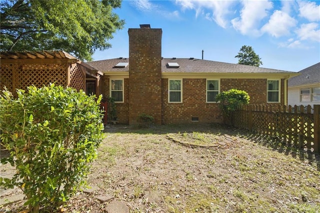 2520 Cantwell Rd, Virginia Beach, VA 23453 - rear view of house featuring a chimney, crawl space, and brick siding