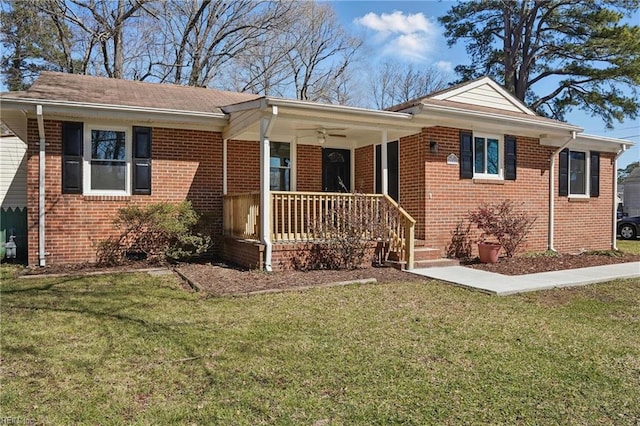 6428 Hudson Ave, Norfolk, VA 23502 - ranch-style house featuring brick siding, a front yard, and covered porch