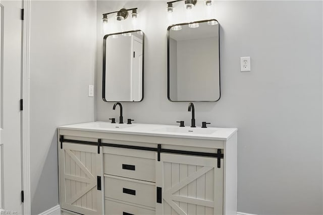 6428 Hudson Ave, Norfolk, VA 23502 - bathroom with double vanity and baseboards
