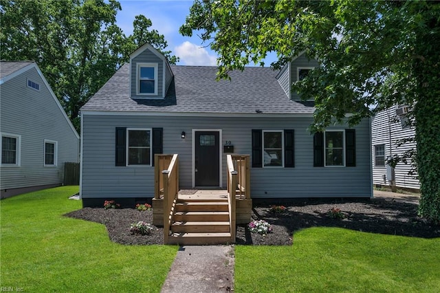 30 W Southampton Ave, Hampton, VA 23669 - cape cod home with a front yard and roof with shingles