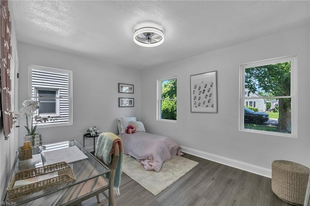 30 W Southampton Ave, Hampton, VA 23669 - bedroom featuring dark wood-type flooring, baseboards, and a textured ceiling