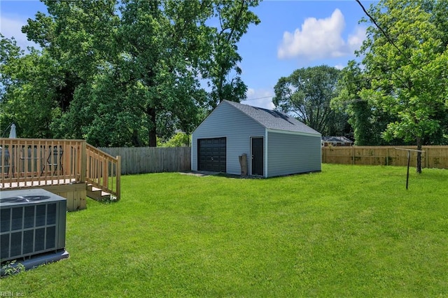 30 W Southampton Ave, Hampton, VA 23669 - view of yard with central AC, a garage, an outdoor structure, and a wooden deck