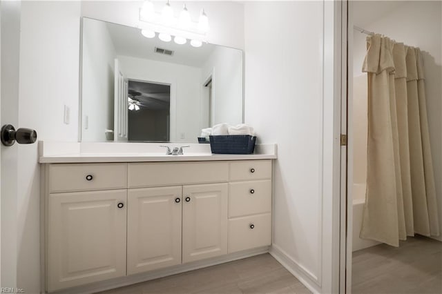 1301 Hawaiian Dr, Virginia Beach, VA 23451 - full bathroom with vanity, baseboards, shower / bath combination with curtain, and a ceiling fan