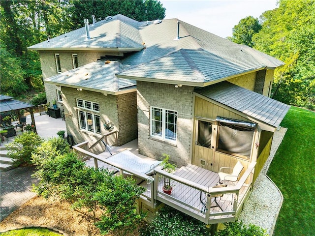1301 Hawaiian Dr, Virginia Beach, VA 23451 - rear view of house featuring a wooden deck, a lawn, a gazebo, and roof with shingles