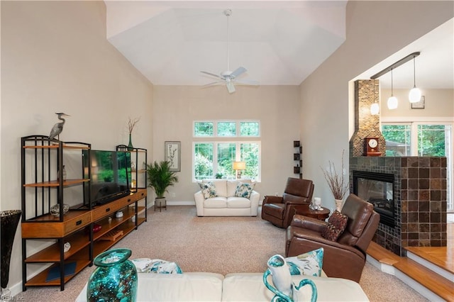 1301 Hawaiian Dr, Virginia Beach, VA 23451 - living area with ceiling fan, a tile fireplace, carpet floors, and high vaulted ceiling