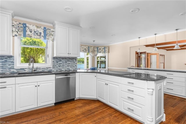 1217 Cogliandro Dr, Chesapeake, VA 23320 - kitchen with stainless steel dishwasher, a sink, a peninsula, dark wood-style flooring, and tasteful backsplash
