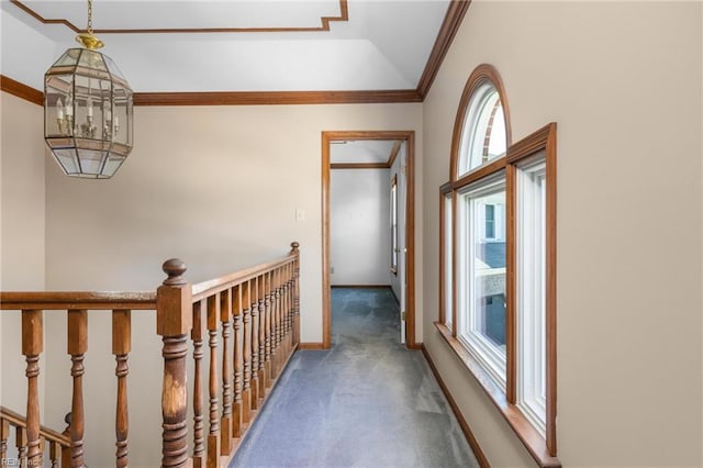 1217 Cogliandro Dr, Chesapeake, VA 23320 - hallway with ornamental molding, carpet, vaulted ceiling, and baseboards