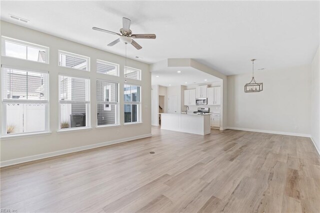 1400 Acadian Dr Unit A, Suffolk, VA 23434 - unfurnished living room with a ceiling fan, light wood finished floors, baseboards, a sink, and recessed lighting