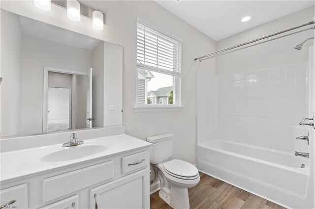 1400 Acadian Dr Unit A, Suffolk, VA 23434 - bathroom with vanity, toilet, shower / bath combination, and wood finished floors