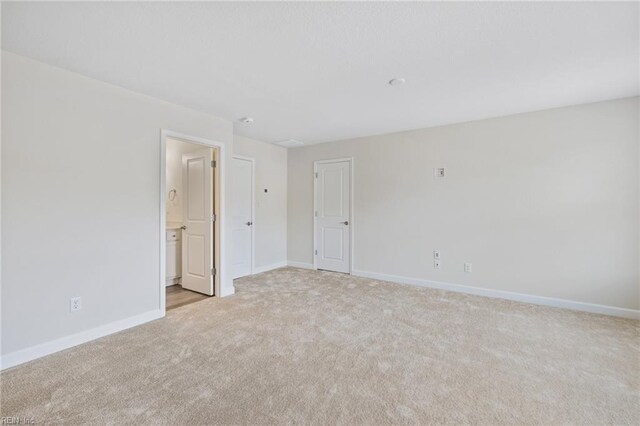 1400 Acadian Dr Unit A, Suffolk, VA 23434 - empty room with light colored carpet and baseboards