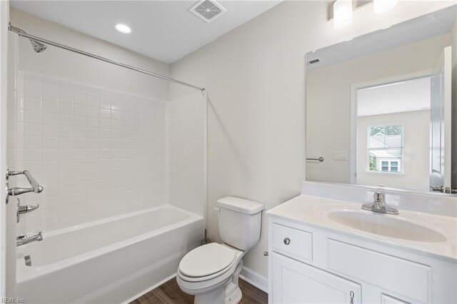 1400 Acadian Dr Unit A, Suffolk, VA 23434 - bathroom with toilet, vanity,  shower combination, wood finished floors, and recessed lighting