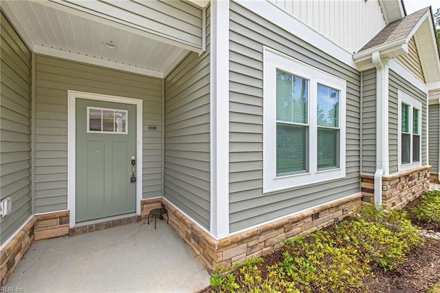 1400 Acadian Dr Unit A, Suffolk, VA 23434 - doorway to property featuring stone siding