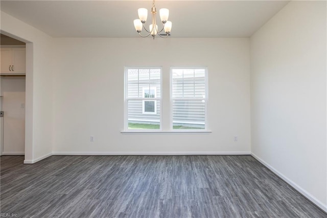 102 Corcoran Ln, Suffolk, VA 23434 - unfurnished dining area with dark wood finished floors, plenty of natural light, a chandelier, and baseboards