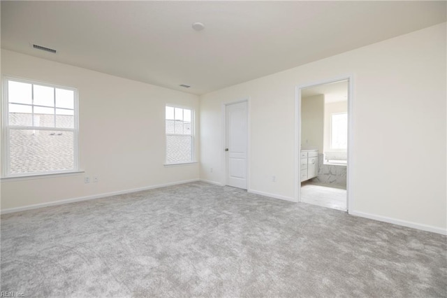 102 Corcoran Ln, Suffolk, VA 23434 - empty room featuring healthy amount of natural light, carpet, and baseboards