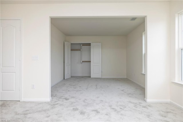 102 Corcoran Ln, Suffolk, VA 23434 - unfurnished bedroom featuring carpet floors, baseboards, and a closet