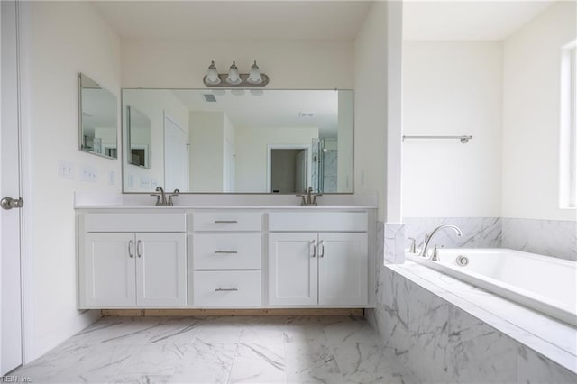 102 Corcoran Ln, Suffolk, VA 23434 - full bath featuring double vanity, marble finish floors, and a garden tub