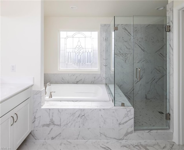 102 Corcoran Ln, Suffolk, VA 23434 - bathroom featuring vanity, a garden tub, and a marble finish shower