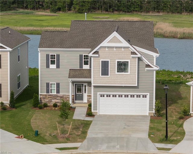 102 Corcoran Ln, Suffolk, VA 23434 - view of front of property featuring concrete driveway, an attached garage, a water view, a front yard, and a shingled roof