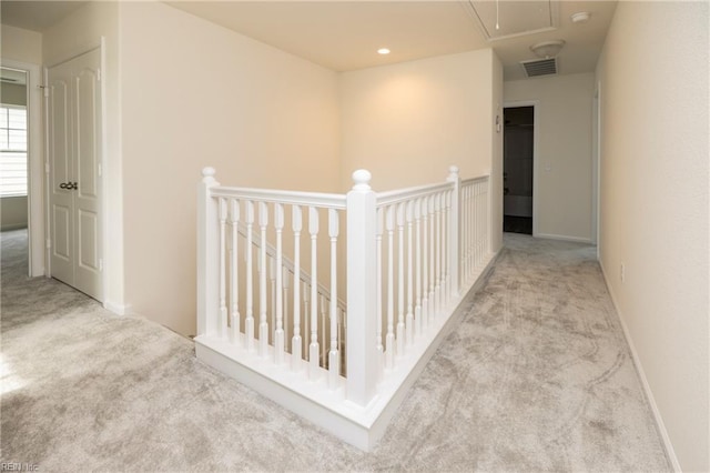 102 Corcoran Ln, Suffolk, VA 23434 - corridor featuring carpet, attic access, an upstairs landing, and baseboards