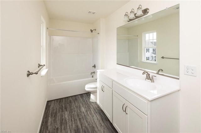 102 Corcoran Ln, Suffolk, VA 23434 - bathroom featuring vanity, toilet, wood finished floors, and shower / bathtub combination