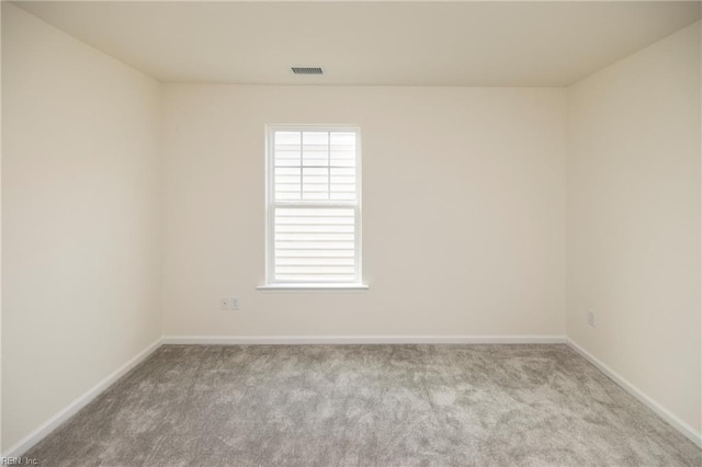 102 Corcoran Ln, Suffolk, VA 23434 - carpeted spare room featuring healthy amount of natural light and baseboards