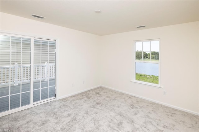 102 Corcoran Ln, Suffolk, VA 23434 - carpeted empty room featuring baseboards