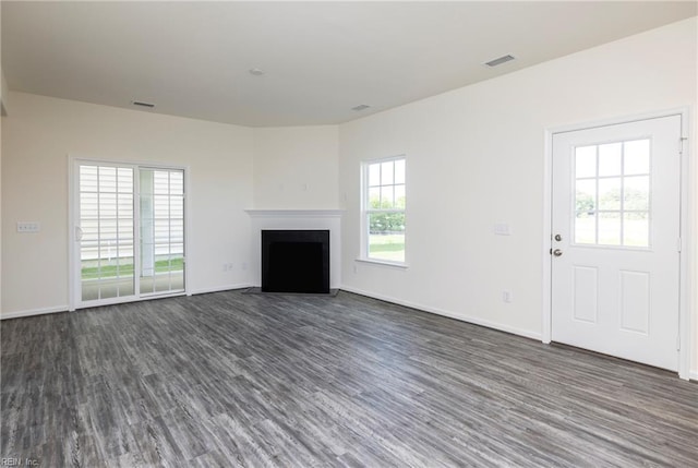 102 Corcoran Ln, Suffolk, VA 23434 - unfurnished living room with dark wood-style floors, a fireplace with flush hearth, and baseboards