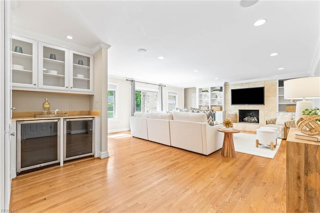 1825 N Alanton Dr, Virginia Beach, VA 23454 - living area with wine cooler, a dry bar, recessed lighting, light wood-style flooring, and baseboards