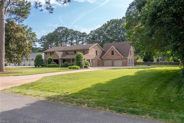 1825 N Alanton Dr, Virginia Beach, VA 23454 - traditional-style home featuring concrete driveway, brick siding, and an attached garage