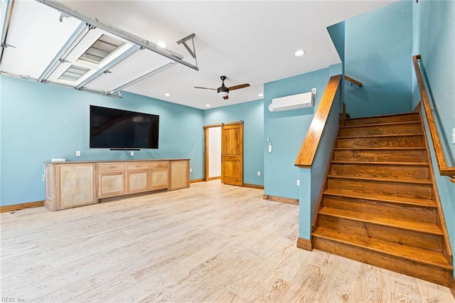 1825 N Alanton Dr, Virginia Beach, VA 23454 - unfurnished living room with a wall unit AC, baseboards, light wood finished floors, ceiling fan, and stairs
