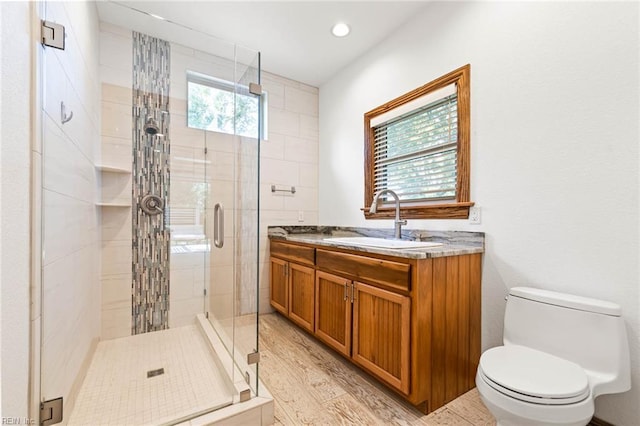 1825 N Alanton Dr, Virginia Beach, VA 23454 - bathroom featuring a stall shower, double vanity, toilet, wood finished floors, and recessed lighting