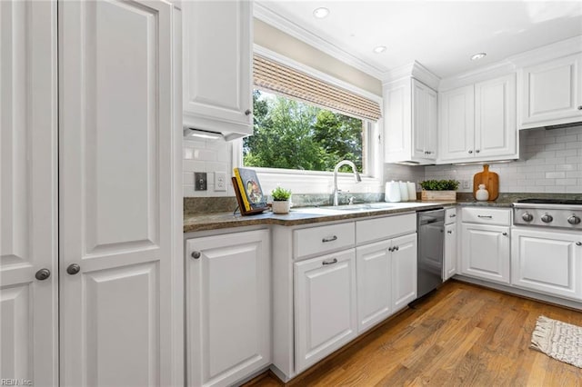 1825 N Alanton Dr, Virginia Beach, VA 23454 - kitchen featuring stainless steel appliances, a sink, white cabinets, decorative backsplash, and ornamental molding