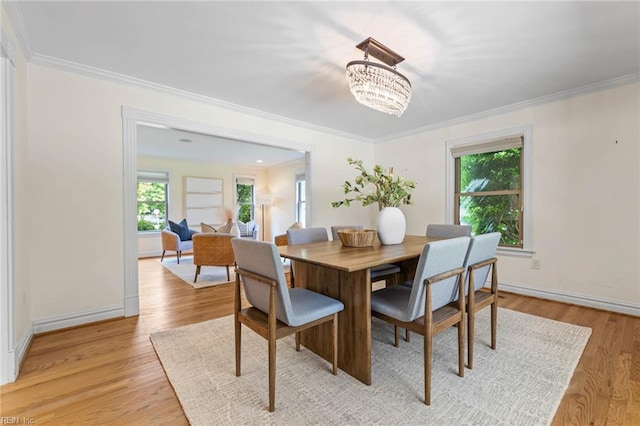 1825 N Alanton Dr, Virginia Beach, VA 23454 - dining area featuring a chandelier, light wood-style flooring, crown molding, and baseboards