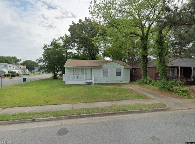4114 Roanoke Ave, Newport News, VA 23607 - ranch-style house featuring covered porch, a front yard, dirt driveway, and crawl space
