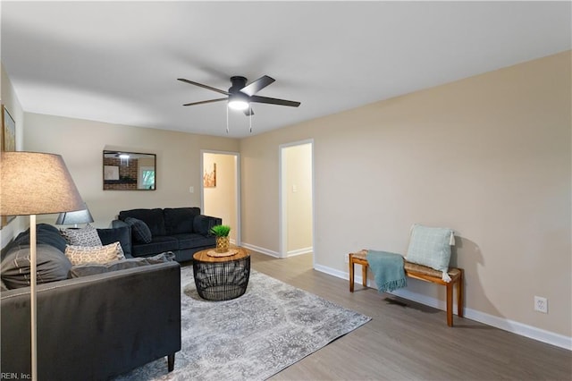 3408 Wakefield Dr, Portsmouth, VA 23703 - living room with ceiling fan, wood finished floors, and baseboards