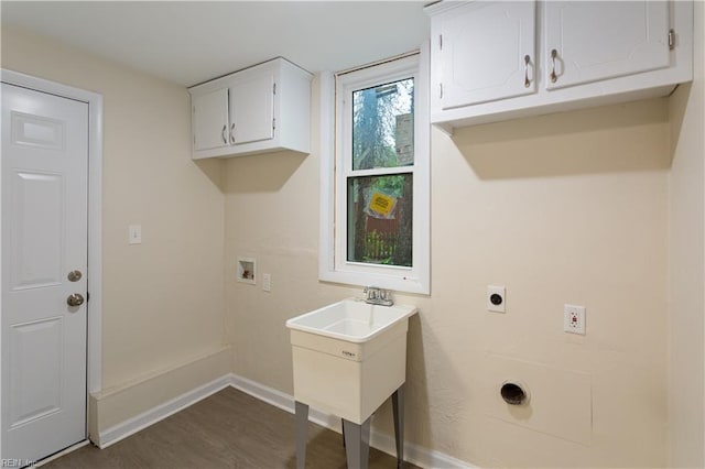 3408 Wakefield Dr, Portsmouth, VA 23703 - washroom featuring hookup for an electric dryer, cabinet space, washer hookup, baseboards, and dark wood-style flooring
