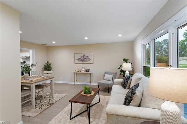 3408 Wakefield Dr, Portsmouth, VA 23703 - living area featuring light wood-type flooring, recessed lighting, and baseboards