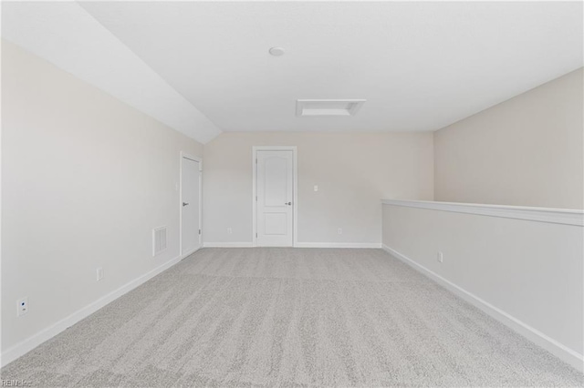 151 Highland Pony Dr, Hertford, NC 27944 - carpeted spare room with attic access, baseboards, and vaulted ceiling