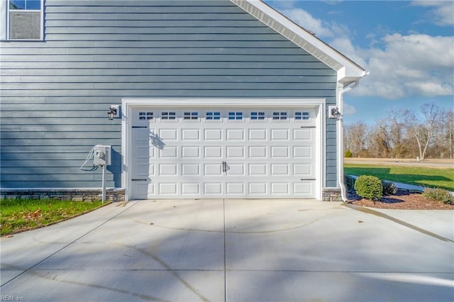 151 Highland Pony Dr, Hertford, NC 27944 - garage featuring concrete driveway