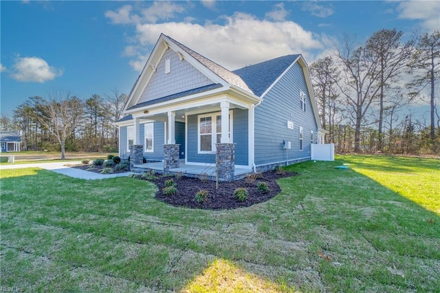 151 Highland Pony Dr, Hertford, NC 27944 - view of front facade featuring covered porch and a front yard