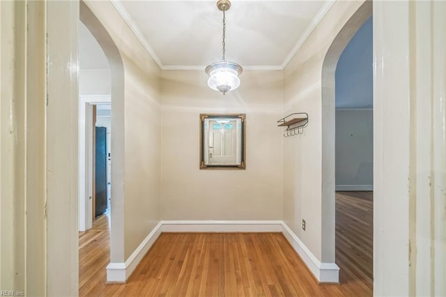 3 Acorn St, Hampton, VA 23669 - hall with arched walkways, light wood-style flooring, ornamental molding, and baseboards